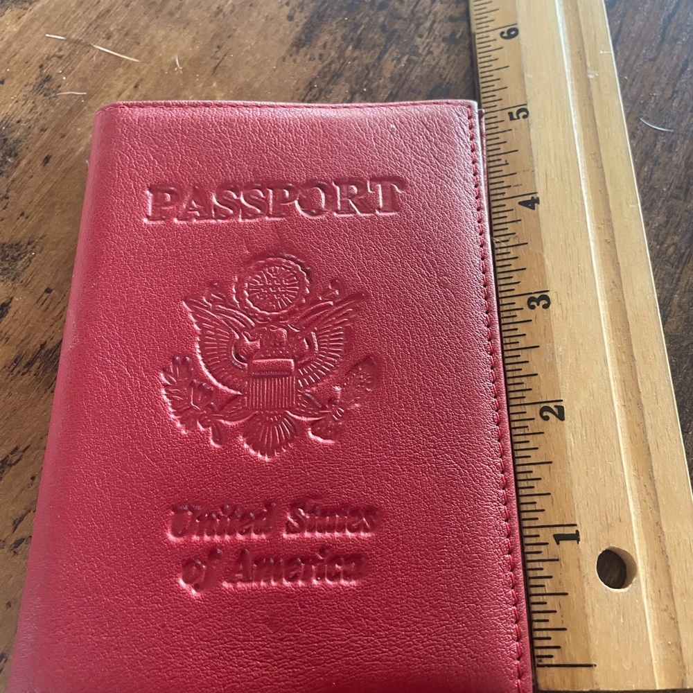 Genuine Wilson’s leather passport carrier.